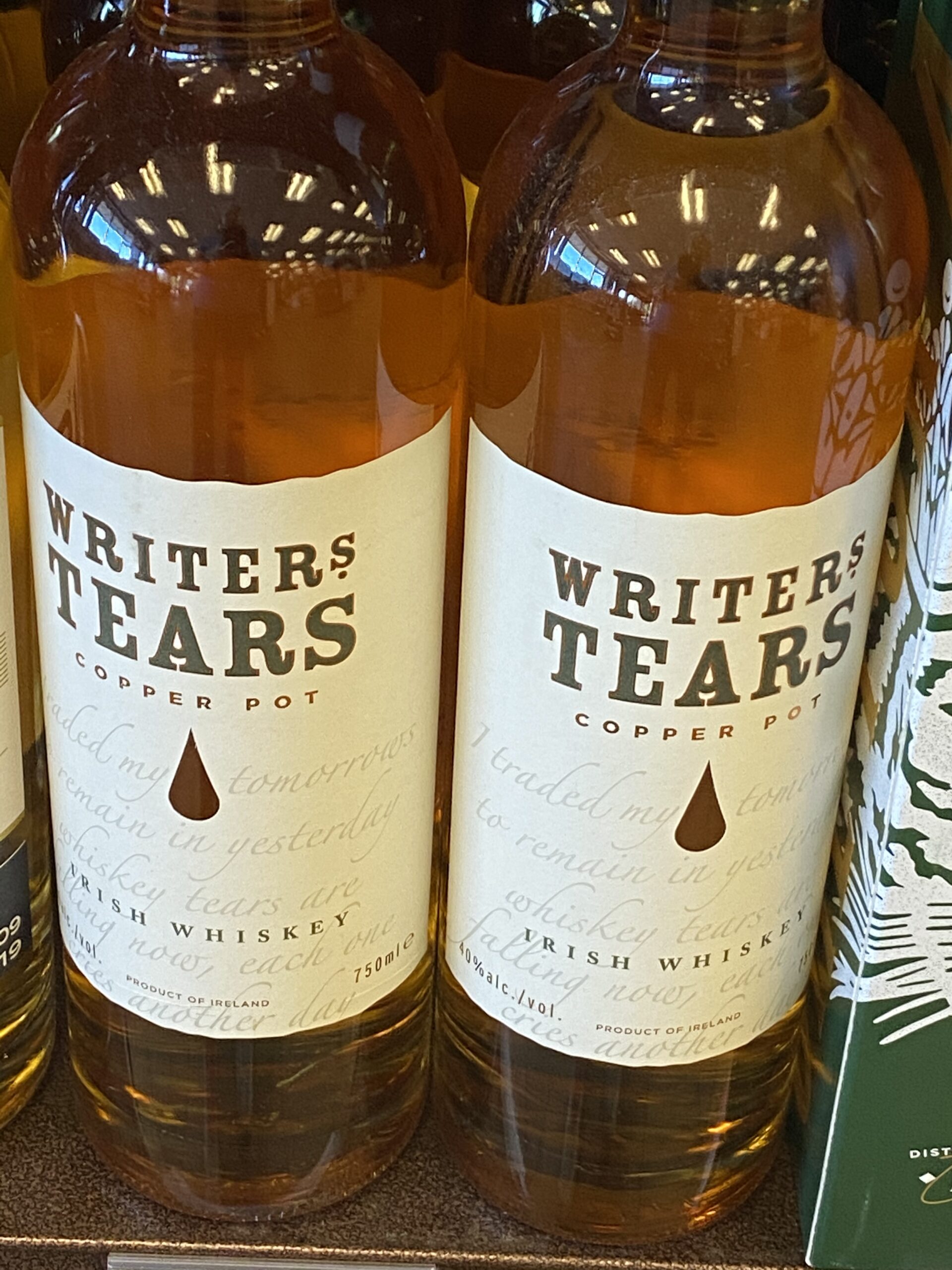 Two bottles of Irish Whiskey called Writers tears.