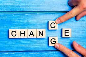 Blue board with tiles spelling the words Chance and Change.