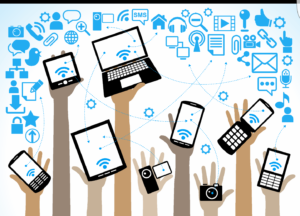 Illustration of several hands holding of various electronic devices.