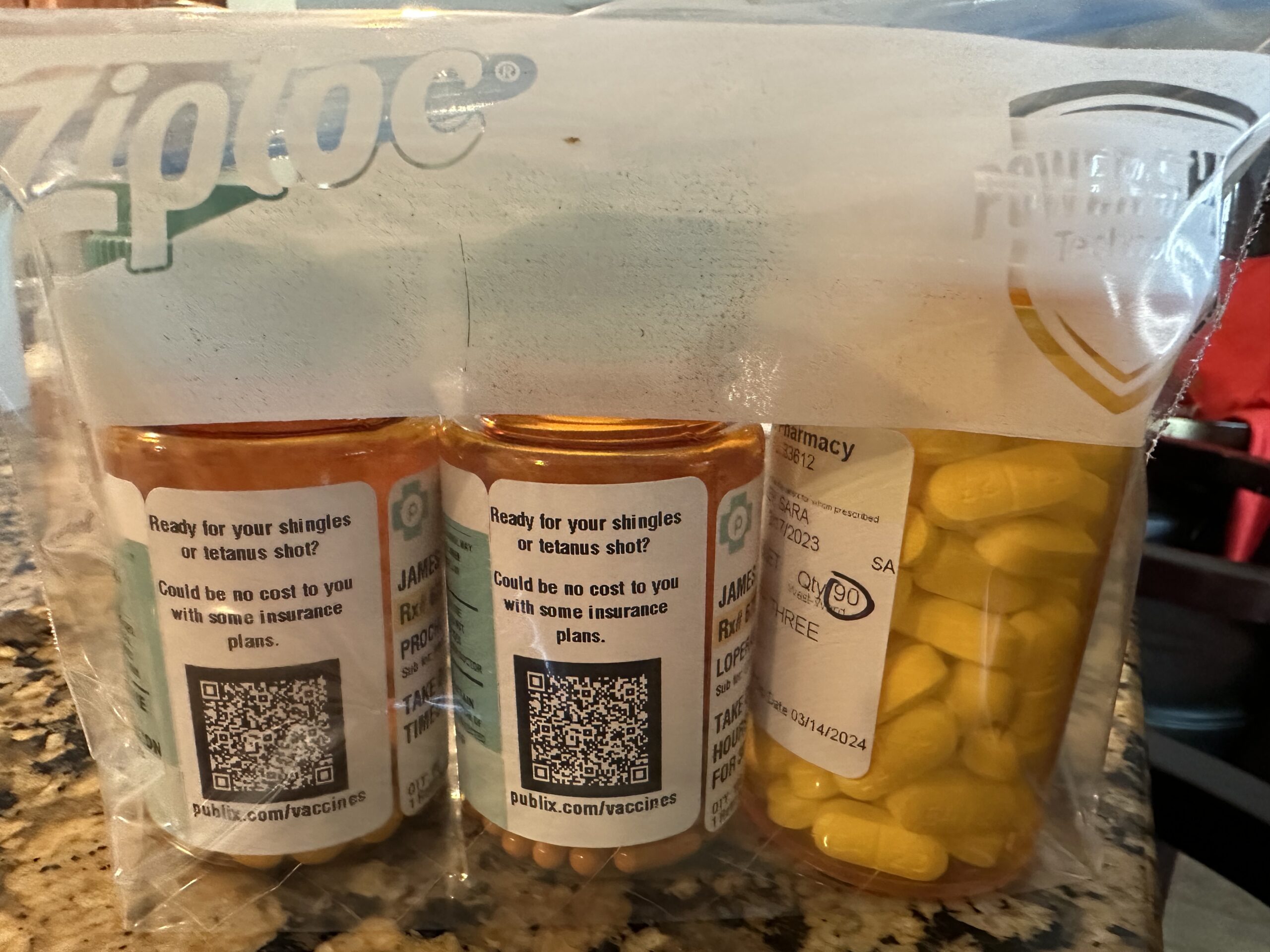 Bottles of pills in ziploc baggie.