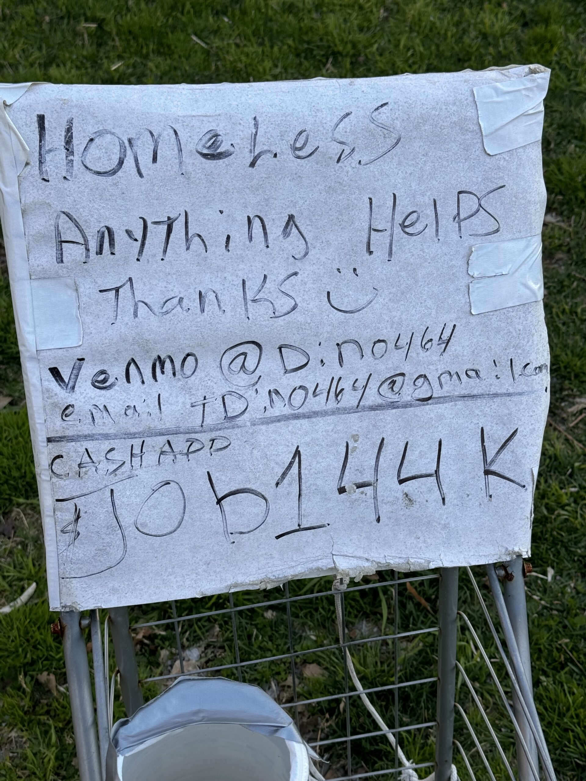 Homeless sign with Venmo and CashApp accounts posted in Washington, D.C.